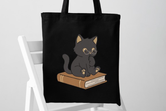 Black tote bag with embroidery design of a thoughtful black cat — Etsy embroidery files for machine embroidery projects