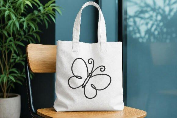 White tote bag with minimalist butterfly embroidery design featuring flowing wings and curved antennae