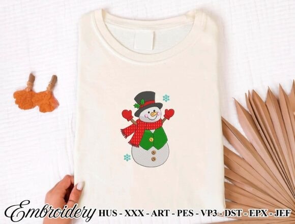 Etsy embroidery files for machine embroidery projects featuring a Christmas snowman design on a white sweatshirt