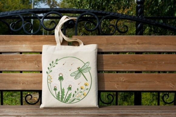 Etsy embroidery files for machine embroidery projects showing a dragonfly and dandelion design on a natural linen tote bag