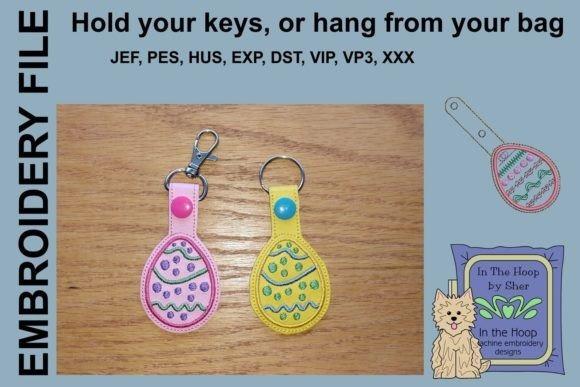 Easter Egg Key Fob 4x4 machine embroidery projects in pink and yellow with decorative stitching and snap buttons