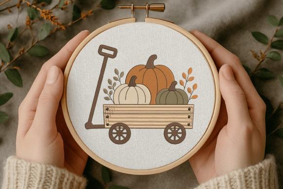 Fall embroidery designs featuring a wooden wagon with three pumpkins and autumn leaves