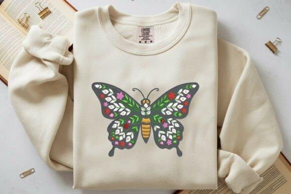 Butterfly embroidery with floral accents on cream sweatshirt