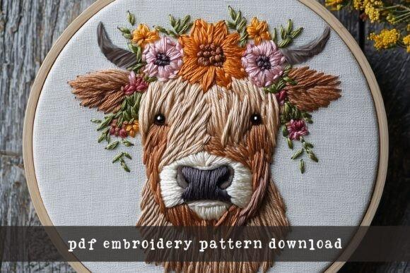 Hand embroidery designs featuring a Highland cow with floral details in a hoop