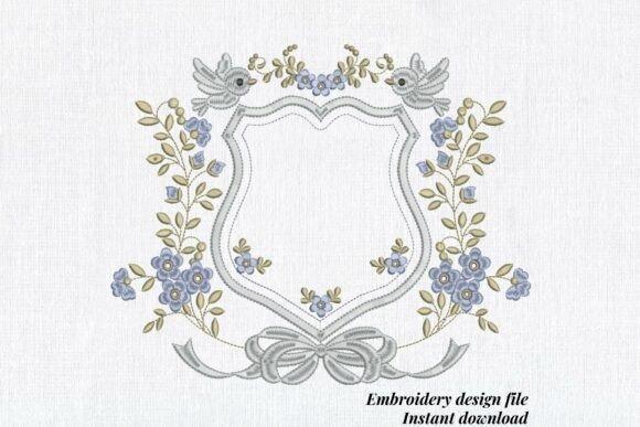 wedding dress embroidery with blue floral frame, greenery, bow, and two birds in pastel colors