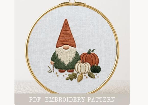 Gnome pumpkin embroidery pattern featuring a gnome with orange hat and three pumpkins in fall embroidery patterns