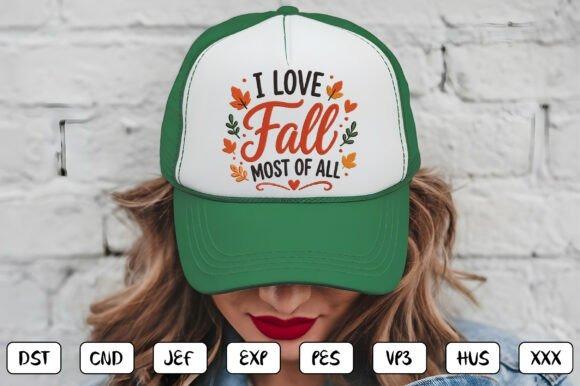 Green and white cap with fall embroidery designs reading I Love Fall Most of All surrounded by autumn leaves