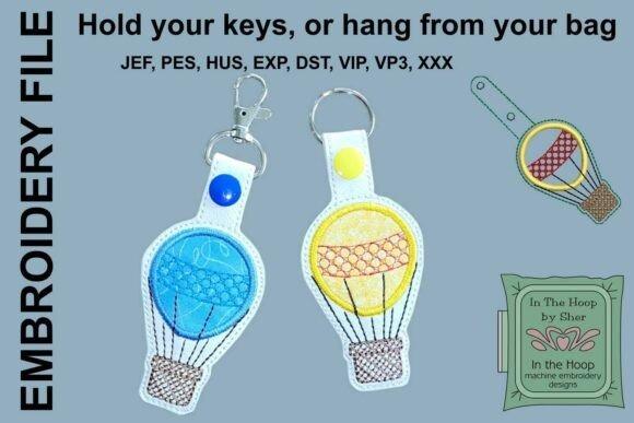 4x4 machine embroidery projects featuring ITH Hot Air Balloon Key Fob in blue and yellow with key rings