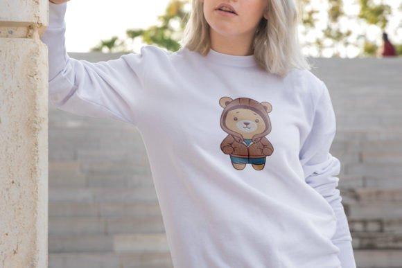 White sweatshirt with a kawaii bear embroidery design on the front, featuring a cute teddy-style bear in — animal embroidery
