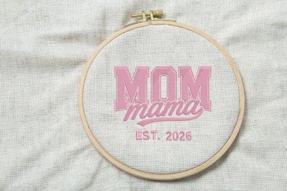 Machine embroidery patch with pink varsity style MOM lettering and cursive mama on white fabric