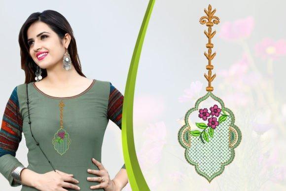 Embroidery shirt with a neckline motif featuring floral and geometric design in green and pink
