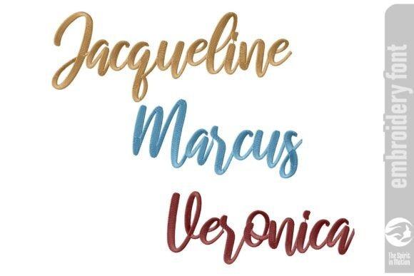 Three names embroidered in cursive embroidery font in brown, blue, and red threads