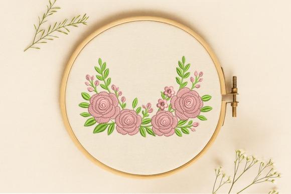 rose embroidery designs featuring pink roses and green leaves in a horizontal arrangement inside an embroidery hoop