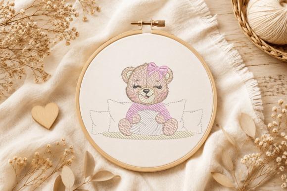 Sleeping teddy bear embroidery design with pink bow in hoop for baby projects