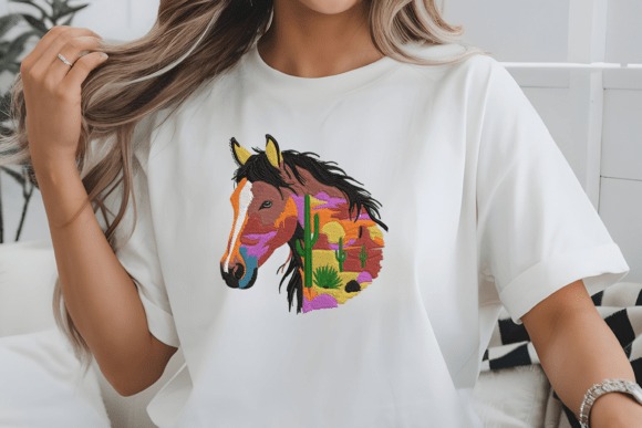 Etsy embroidery files for machine embroidery projects featuring a colorful western horse desert design on a white t-shirt
