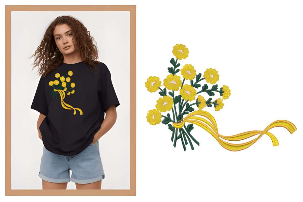 Yellow floral machine embroidery designs for various styles on black t-shirt worn by model