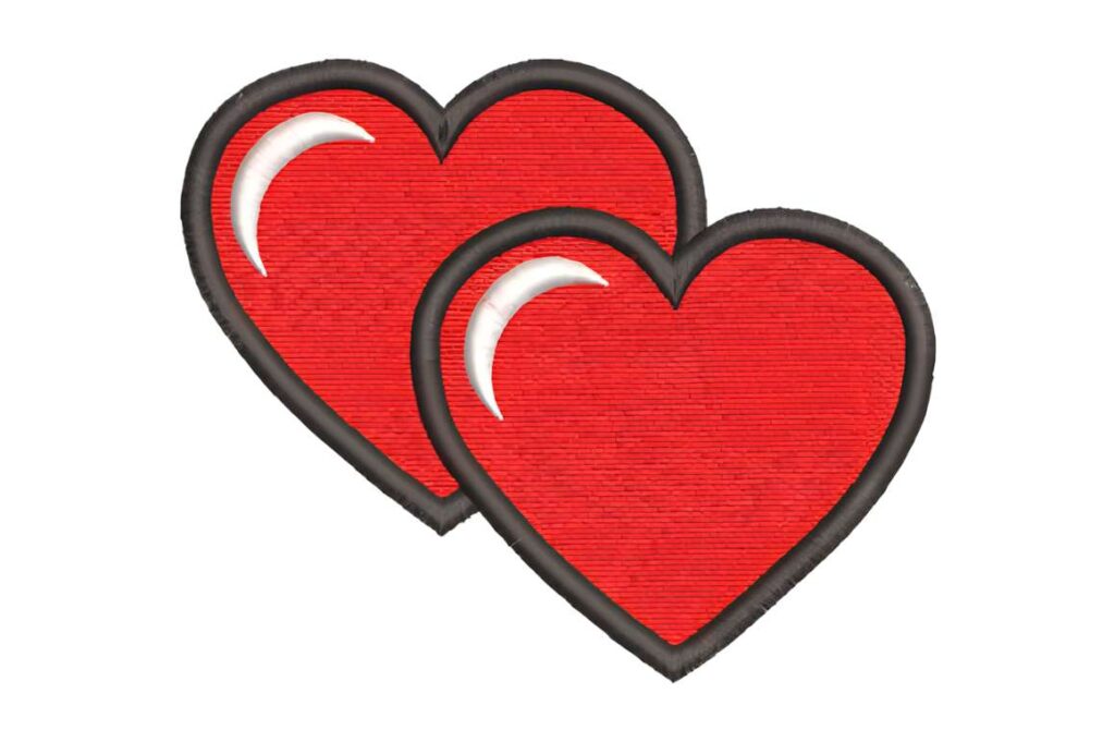 Two red heart machine embroidery designs for various styles with black borders and white highlights