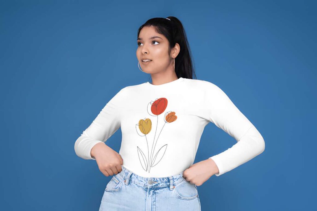 Young woman wearing a white top with minimalist floral machine embroidery designs for various styles