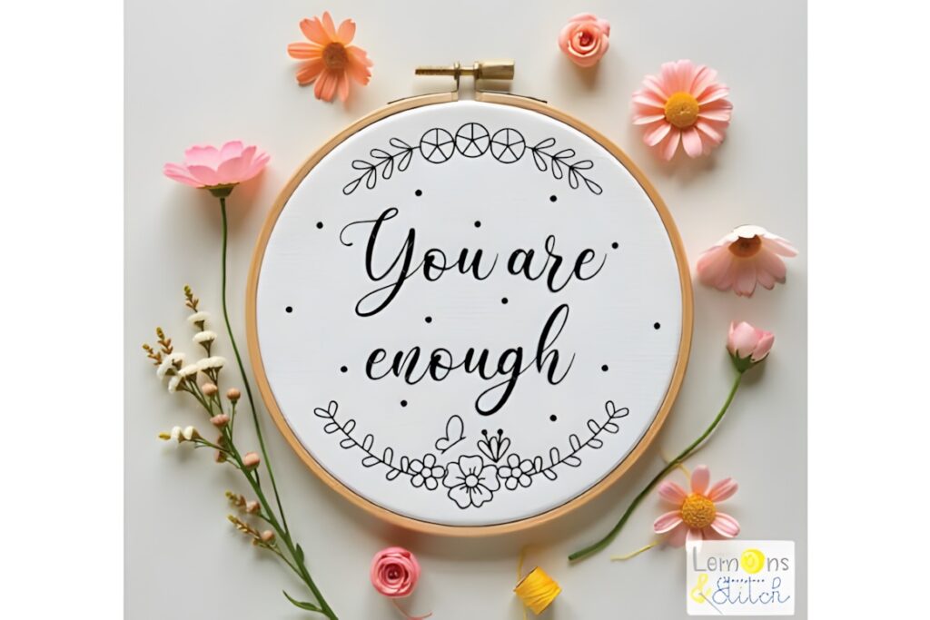 Hand embroidery patterns hoop with You are enough quote surrounded by flowers and butterfly design